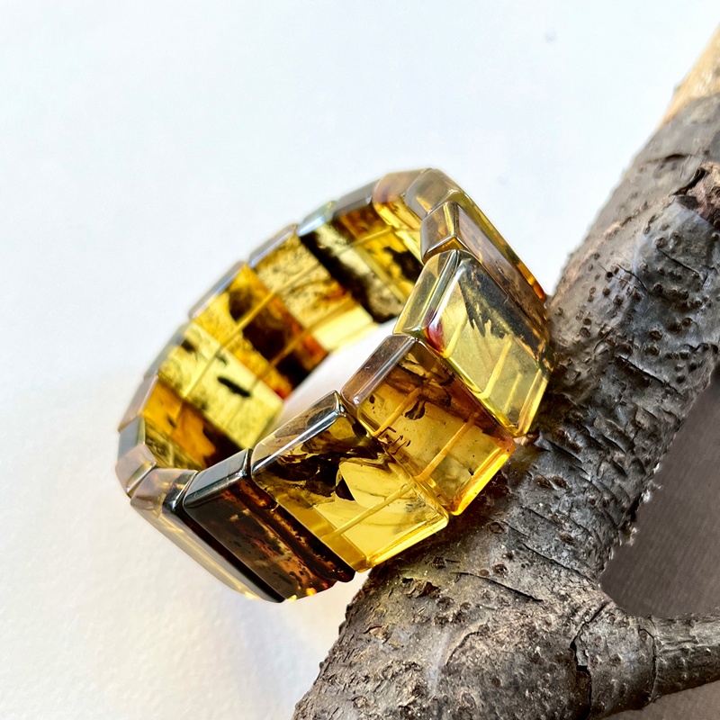 Браслет Муж. янтарь 3211119492-4