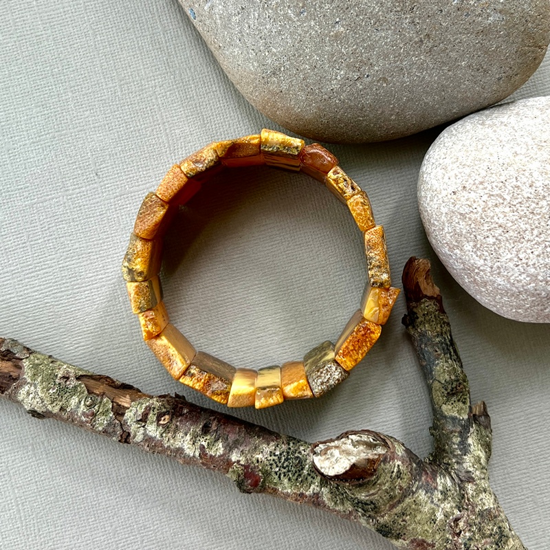 Браслет пласт. янтарь 3341109393-1