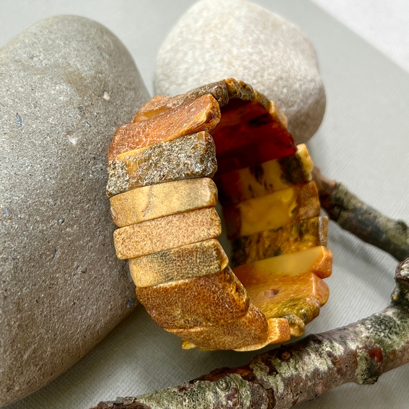 Браслет пласт. янтарь 3341109393-3