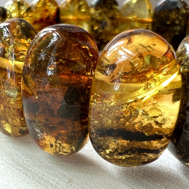 Браслет пласт. янтарь 32119460-4