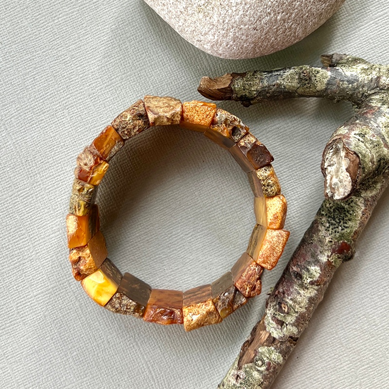 Браслет пласт. янтарь 3351119393-1