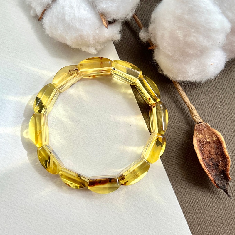 Браслет пласт. янтарь 3401119456-1