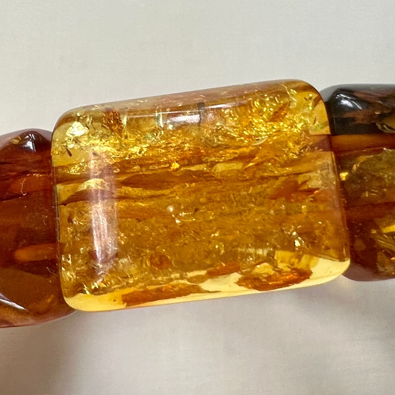 Браслет пласт. янтарь 3121119456-4