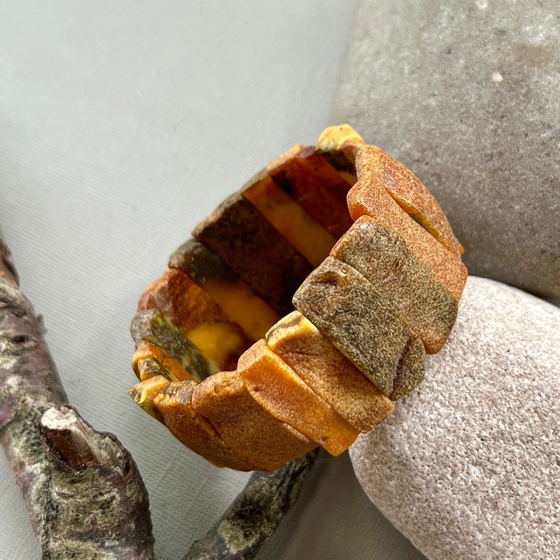 Браслет пласт. янтарь 3341109393-2